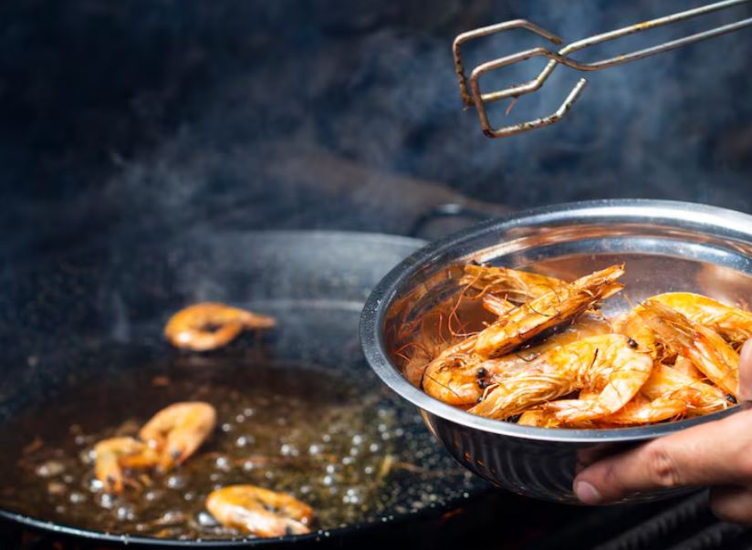 can you reheat cooked prawns more than once