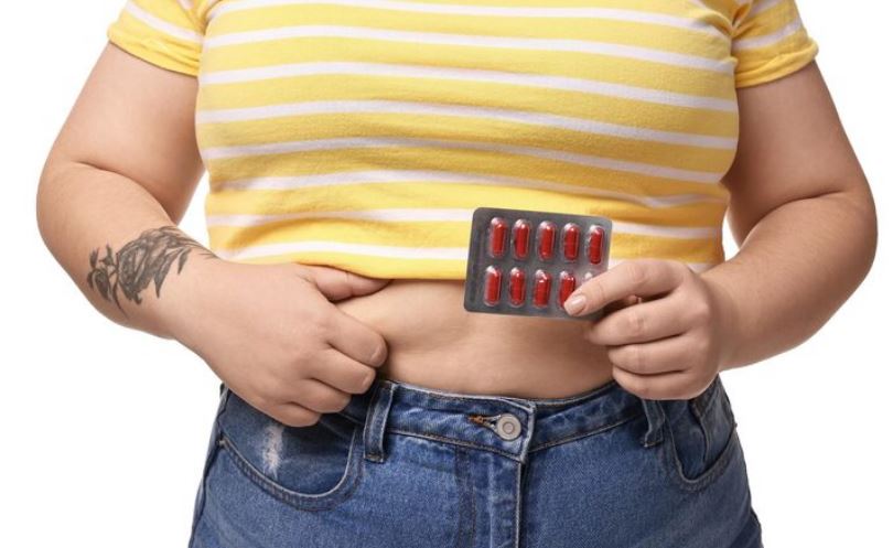 weight gain due to medication icd 10
